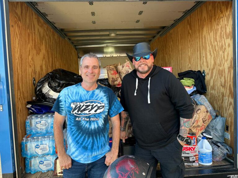 Steve Smith and Mojo from 104.3 WZYP's Tornado relief effort