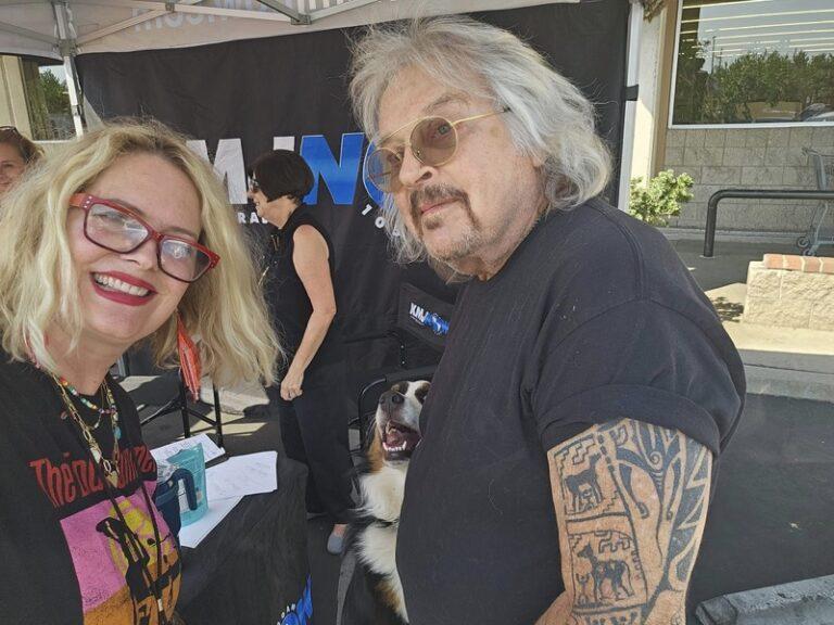 Liz Kern, KMJ Anchor, and Ray Appleton, On-Air Host, KMJ, with Ray's dog Elvis.